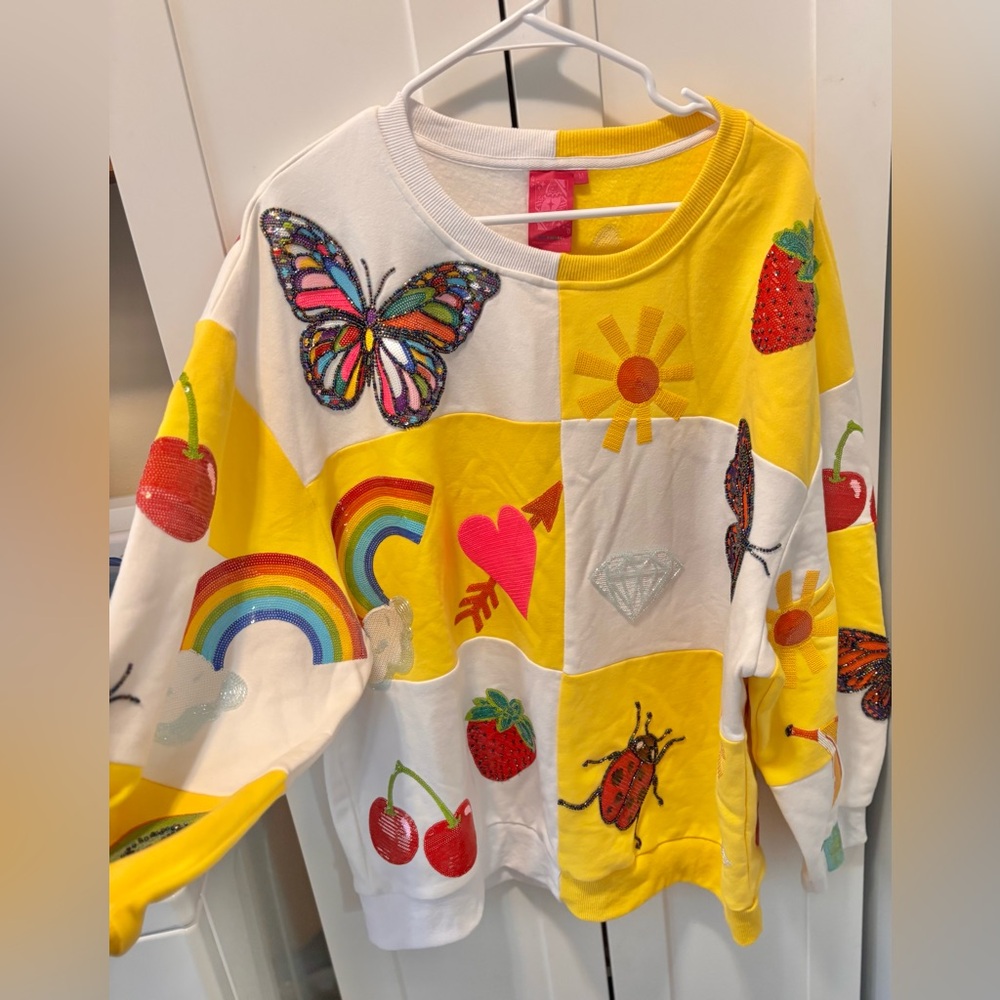 Queen of sparkles yellow checkered sweater